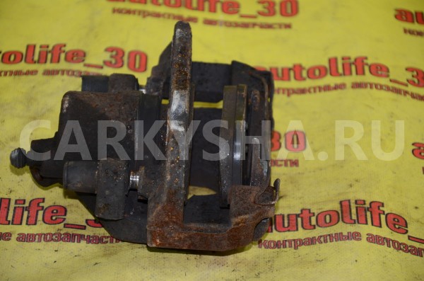 Суппорт тормозной передний левый Ford Focus 