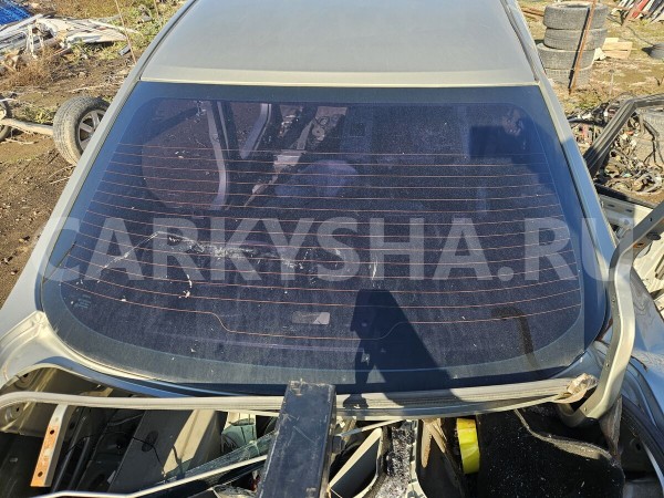 Стекло заднее Nissan Almera 
