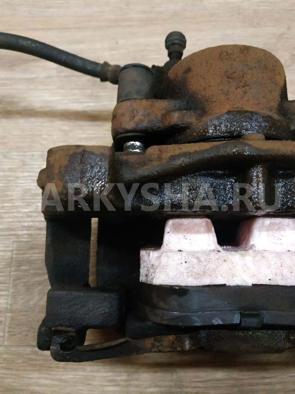 Суппорт тормозной передний левый Ford Mondeo оригинальный номер 1583140