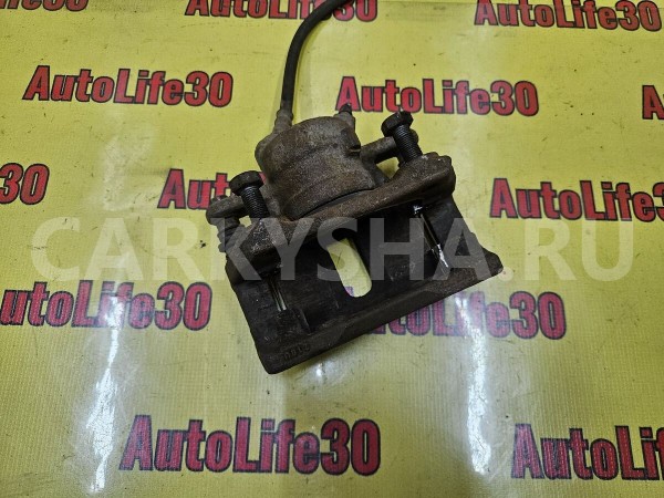 Суппорт тормозной передний правый Nissan Almera 