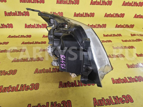 Фара левая Subaru Forester 