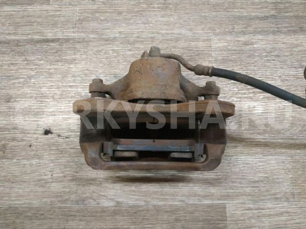 Суппорт тормозной передний правый Hyundai ix35 оригинальный номер 581302Y000