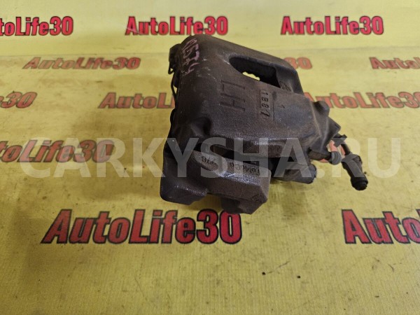 Суппорт тормозной передний левый Ford Focus 