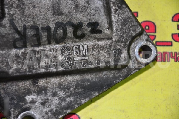 Ролик-натяжитель Opel Astra 