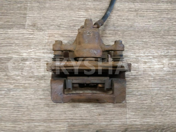 Суппорт тормозной задний правый Hyundai ix35 оригинальный номер 582302S000