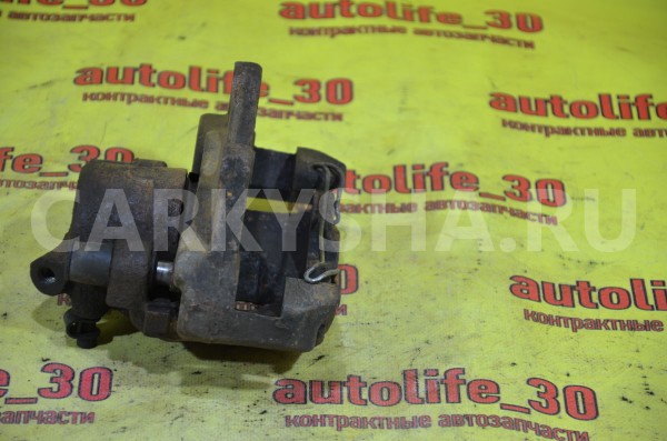 Суппорт тормозной передний левый Fiat Doblo 