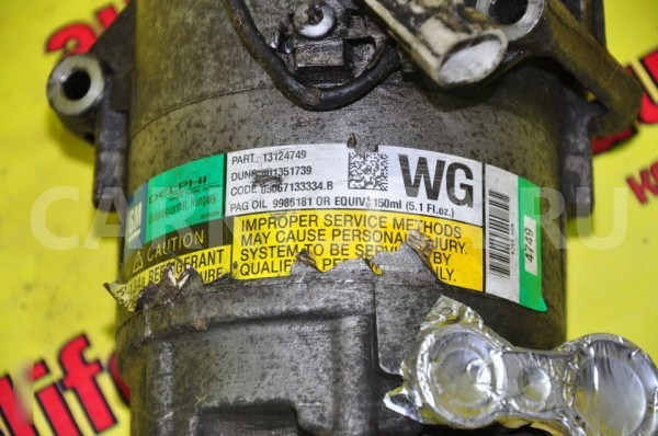 Компрессор кондиционера Opel Astra 