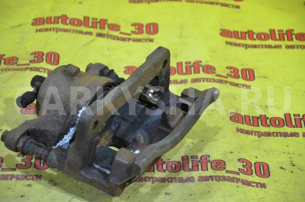 Суппорт тормозной передний левый Honda Civic 